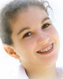 smiling girl with braces